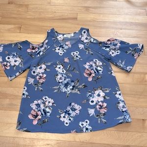 Women’s floral blouse with  cutout shoulders